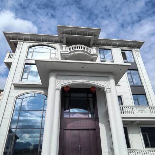 黄石白麻别墅外墙干挂石材效果示例