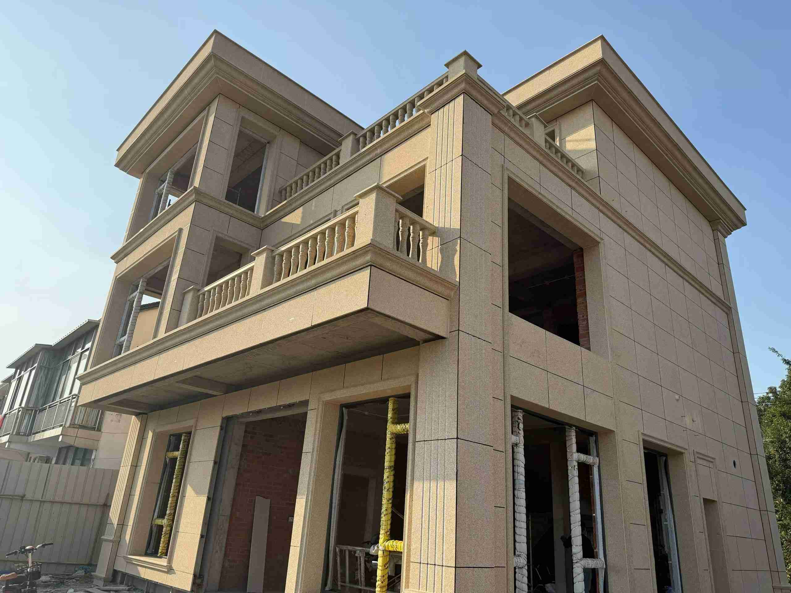 黄石 黄金麻花岗岩石材荔枝面外墙干挂效果展示